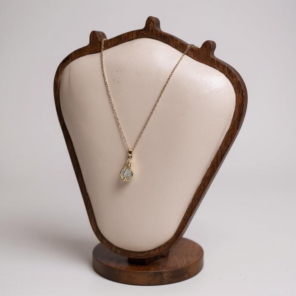 Golden Teardrop Crystal Necklace – Elegant Blue Accent