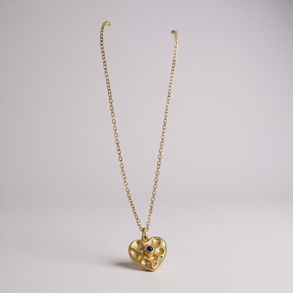 Glimiora Vintage Heart Charm Necklace – Antique Gold with Sapphire Accents