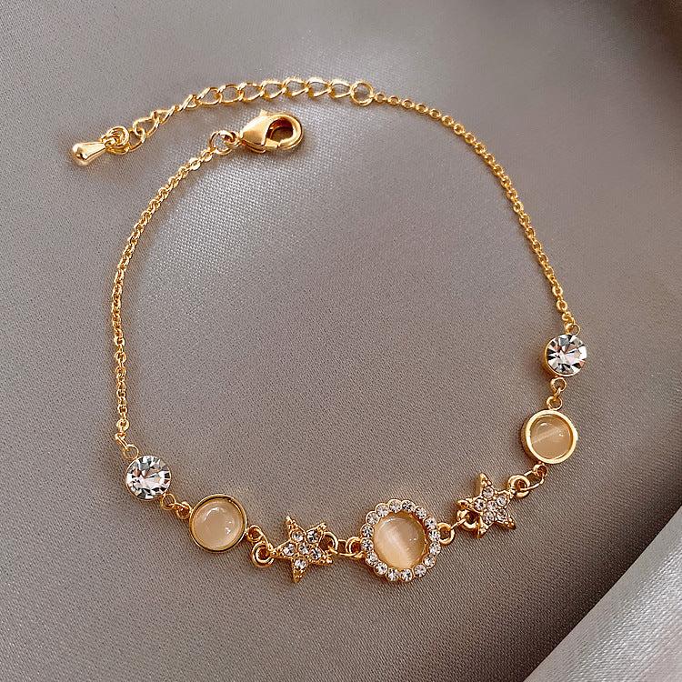 Celestial Charm Bracelet – Opaline Cabochon & Pavé Stars (Gold-Tone, Adjustable)