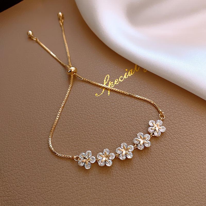 Starflower Crystal Bolo Bracelet – Adjustable Gold-Tone