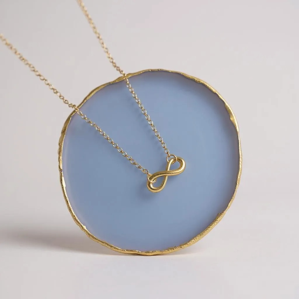 Golden Infinity Necklace – Symbol of Endless Elegance