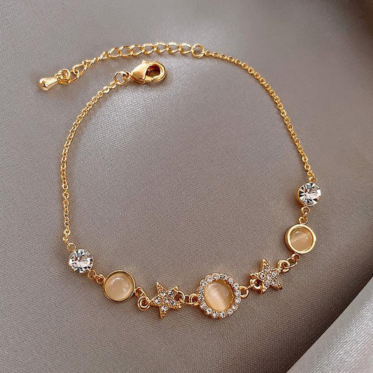 Celestial Charm Bracelet – Opaline Cabochon & Pavé Stars (Gold-Tone, Adjustable)